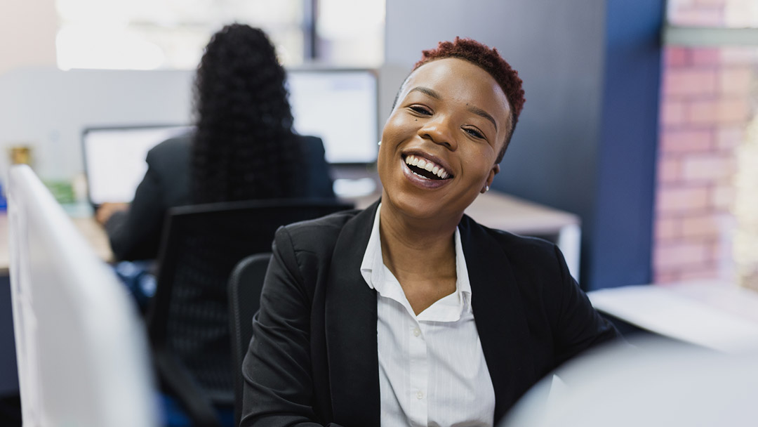 CreditSmart_Careers_2 Lady smiling at CreditSmart