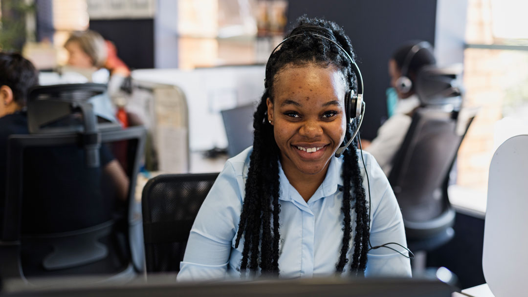 CreditSmart_Careers_New3 CreditSmart_Lady smiling at the camera